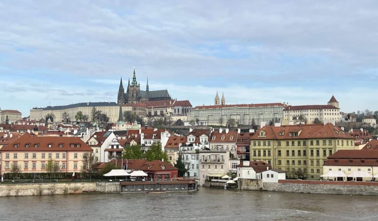 A sunny day with a blue sky over the historic Old Town of Prague in Czechia"